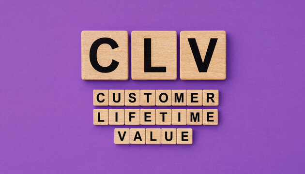 CLV customer lifetime value concept spelled with wooden letter tiles on purple background