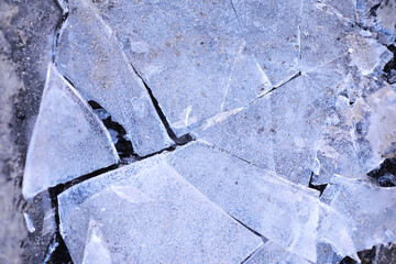 Crashed ice concrete surface background texture. Frozen ice surface of a lake in sunset © alexkich