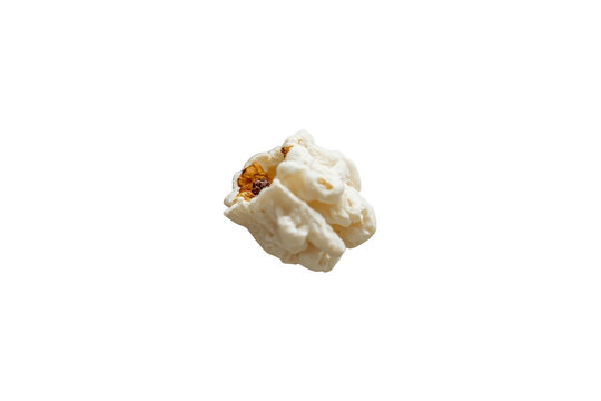 Single white popcorn kernel with golden brown center