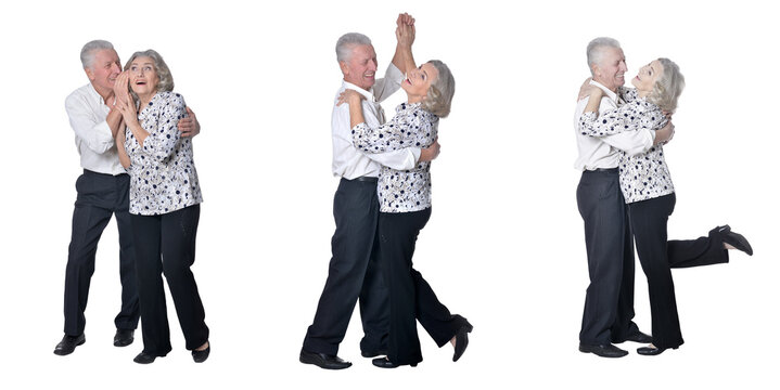 Senior couple dancing together on white background