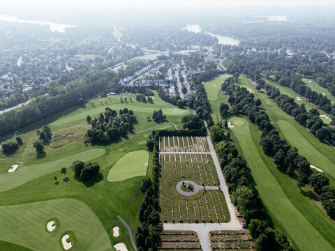 Aerial view of lush golf course near Laval Quebec Canada with ponds, trees and fairways. g.