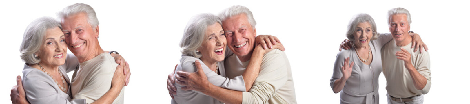 Happy Senior Couple Embracing and Smiling on White Background