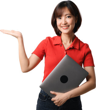 Happy smiling asian woman presenting copy space holding laptop computer wearing casual red shirt for business marketing promotion
