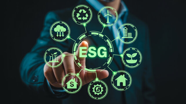 Corporate leader selecting esg strategy icons on digital screen.