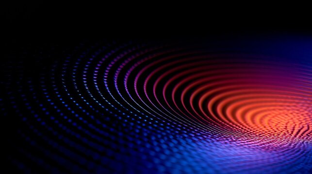 Vibrant radial waves emanate from a central point, displaying a spectrum of red, blue, and purple hues, representing technology and futuristic concepts