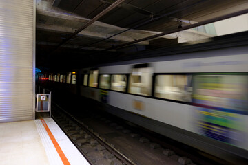 Fototapeta premium High-Speed Metro Entering a Tunnel in Donostia-San Sebastian, Euskadi