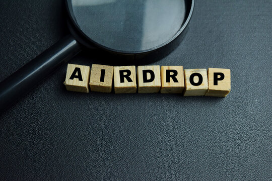 Concept of airdrop text on wooden blocks.