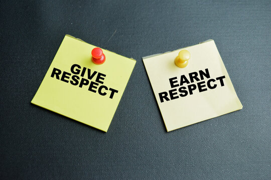 Concept of give respect and earn respect write on sticky notes isolated on table.