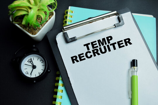 Concept of temp recruiter write on clipboard isolated on table.
