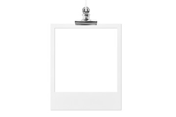 Blank photo frame hanging on a rope with a metal clip clothespin. Isolated transparent PNG mockup. © vovan