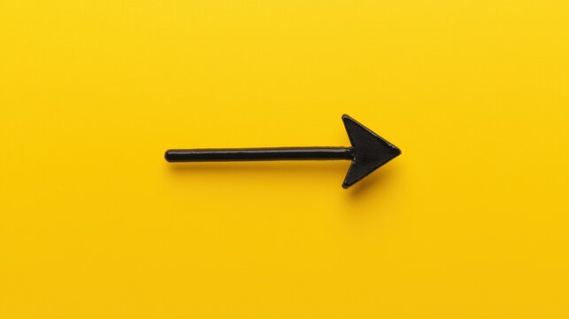 A black arrow pointing right.