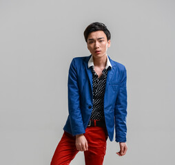 Fototapeta premium Stylish East Asian Man in Polka Dot Blazer Studio Portrait