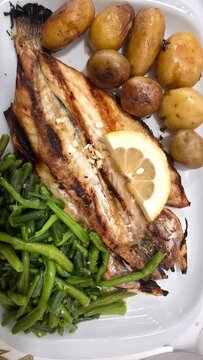 grilled steak with vegetables, Grilled sea bass with potatoes and green beans