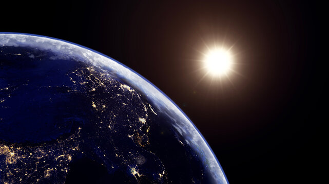Earth from space at night, illuminated by city lights with the bright Sun in dark space.