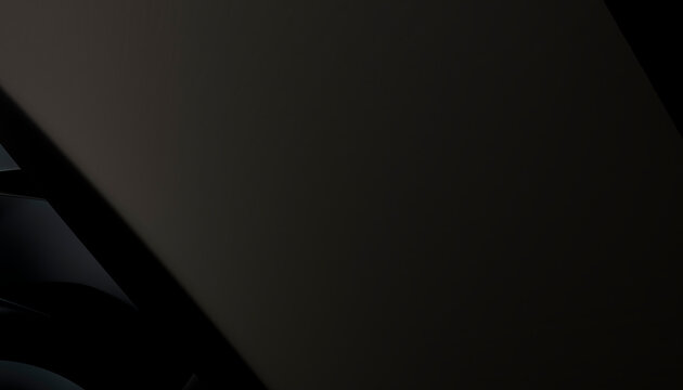 Close-up of a smooth black surface with abstract reflective shapes