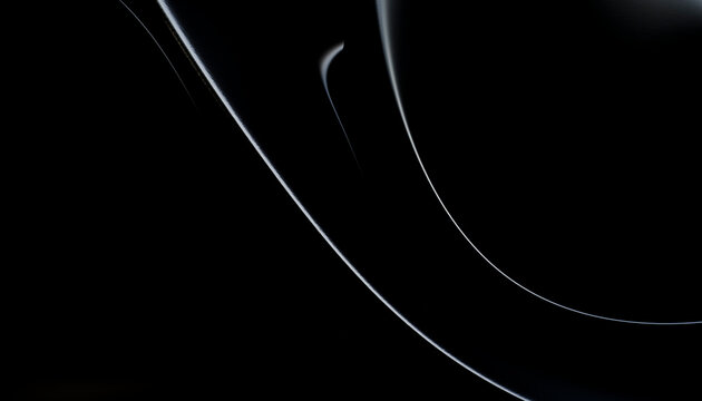 Close-up of black ceramic plates arranged in a minimalist style
