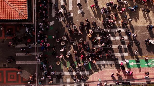 Indigenous people celebrating the inti raymi festival in cotacachi, ecuador, seen from above