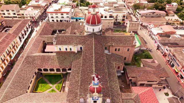 Aerial view of a crowd celebrating the inti raymi festival in the main square of cotacachi, ecuador