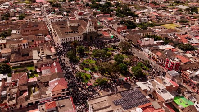 Aerial view of a large crowd celebrating the inti raymi festival in cotacachi, ecuador