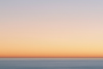 Obraz premium Minimal Horizon Over Calm Sea Water at Sunset Golden Hour