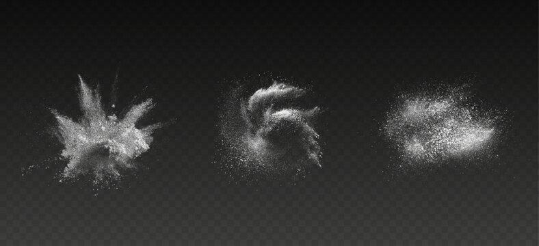 White talcum dust splash with airborne powder particles creating an abstract burst on black background.