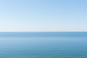 Fototapeta premium Peaceful minimalist sea surface with soft blue gradient horizon
