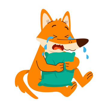A sad orange fox sits holding a teal cushion while large blue tears fall from its eyes, showing an emotional cartoon illustration 