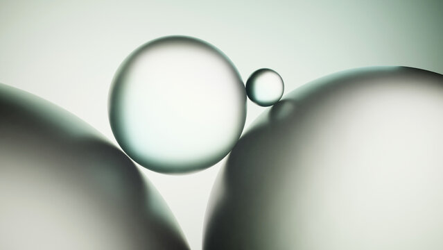Clear glass orb between soft gray shapes on minimal background.