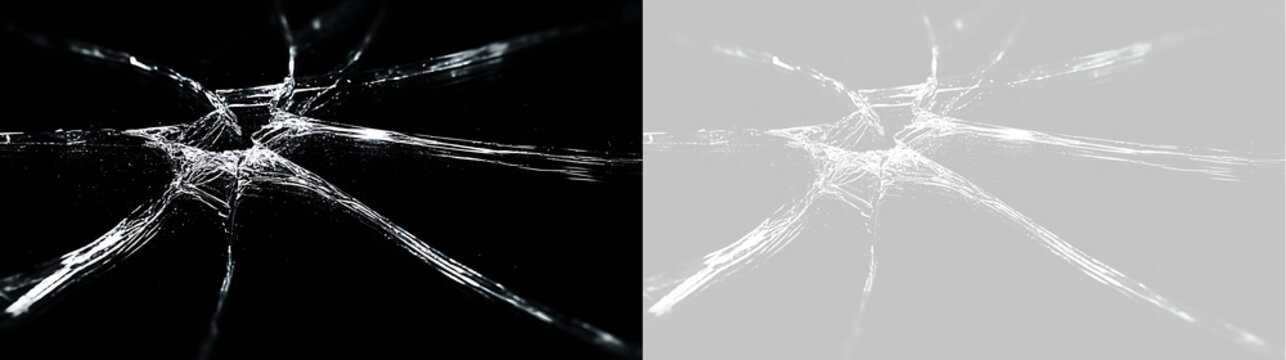 Cracked glass texture overlay on transparent background. Broken shattered window screen impact effect