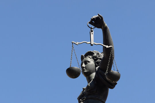 Lady Justice statue at Frankfurt R&ouml;mer square as symbol for Justice
