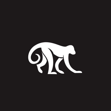 Stylized white monkey logo or icon on a dark background, representing an animal silhouette for modern branding and design