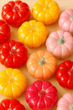 Halloween pumpkins background in pastel colors, suitable for seasonal designs