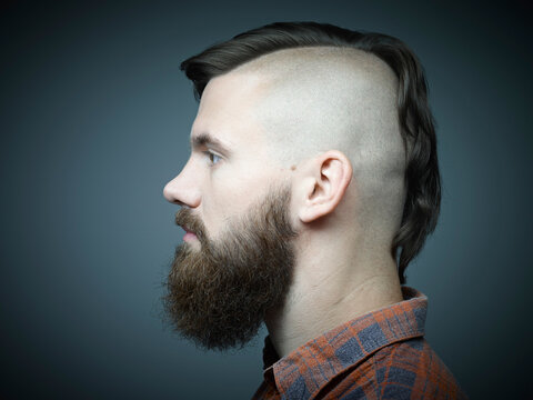 Profile of young man with shaved head