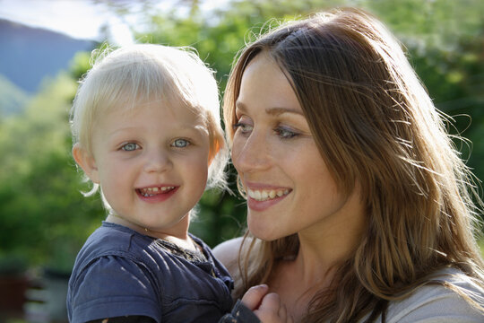 Germany, Bavaria, Mother and daughter smiling