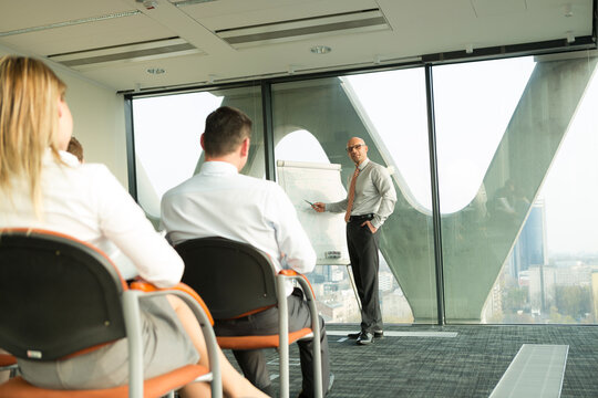 Group of businesspeople attending a seminar