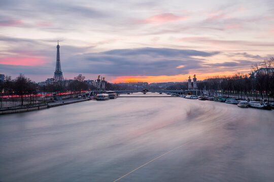 France, Paris, view to Seine River with Pont Alexandre III and the Eiffel Tower in the background at sunset