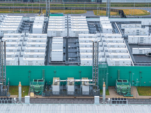 Aerial view of the Agriport A7 hyperscale data center campus featuring rows of white cooling units and industrial infrastructure in Middenmeer, Noord-Holland, Netherlands.