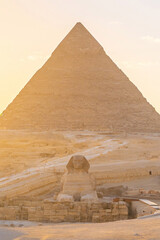 The Great Sphinx and the iconic Pyramid of Khafre in the Giza desert landscape © f11photo