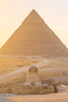 The Great Sphinx and the iconic Pyramid of Khafre in the Giza desert landscape