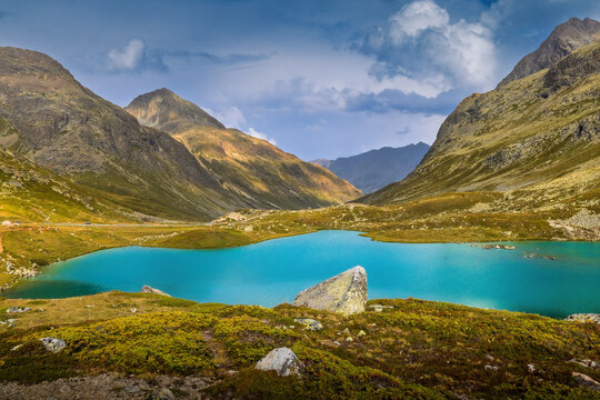 Scenic view of turquoise mountain lake at Julier Pass in the Swiss Alps