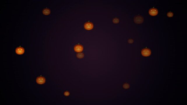 Spooky Halloween glowing pumpkin faces seamless loop background