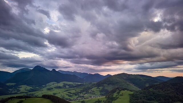 Aerial View of Heavy Dramatic Clouds Over Hilly Carpathian Landscape