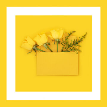 Yellow roses flower bouquet and greenery background border on yellow, white square shape frame. Floral mail art envelope abstract design.