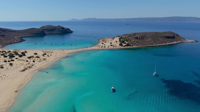 Discover the breathtaking beauty of Simos Beach on Elafonisos Island Greece, where crystal-clear turquoise waters meet soft, golden sands. Relax under the sun and enjoy a perfect escape.