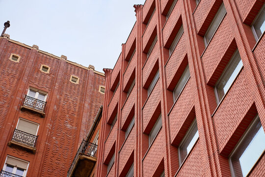 Red brick residential building facade in Budapest
