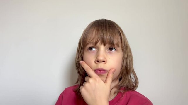 Young boy showing a wide open mouth expression of total astonishment, advertising, social media marketing, shocked face, surprise emotion.