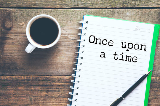once upon a time, text on white paper
