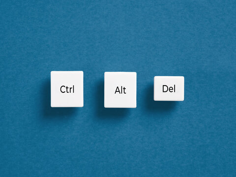 Ctrl Alt Del keyboard keys on blue background