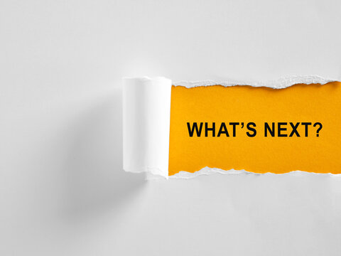 Torn paper revealing what's next Concept