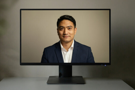 Professional man on a computer monitor screen